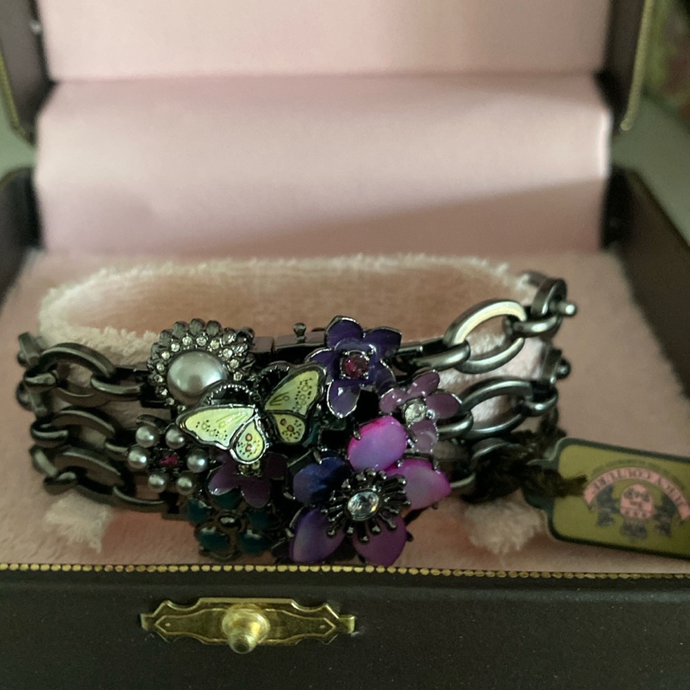 Juicy couture embellished purple flower bracelet. NWT in original box